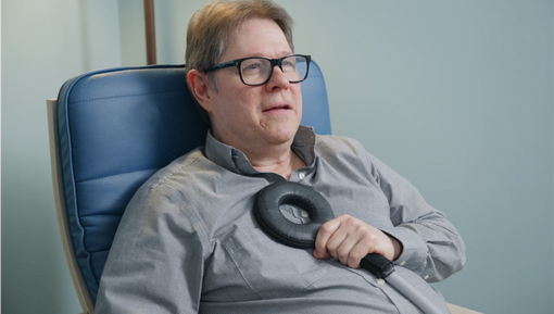 A man using PEMF accessories for pain relief, recovery and relaxation